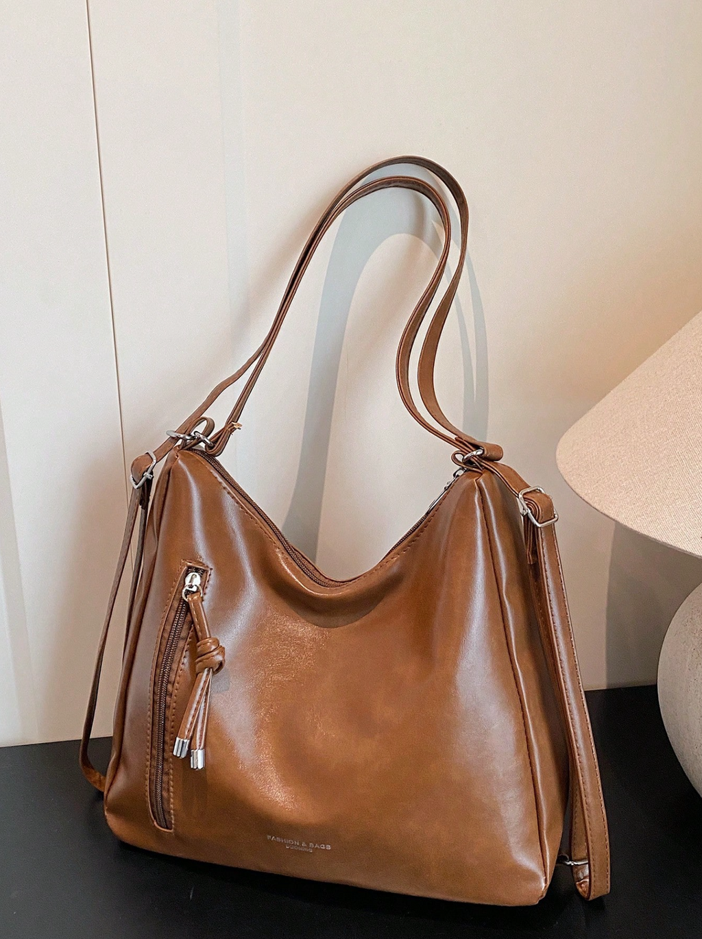 The Angled Zip Convertible Tote Elitaire