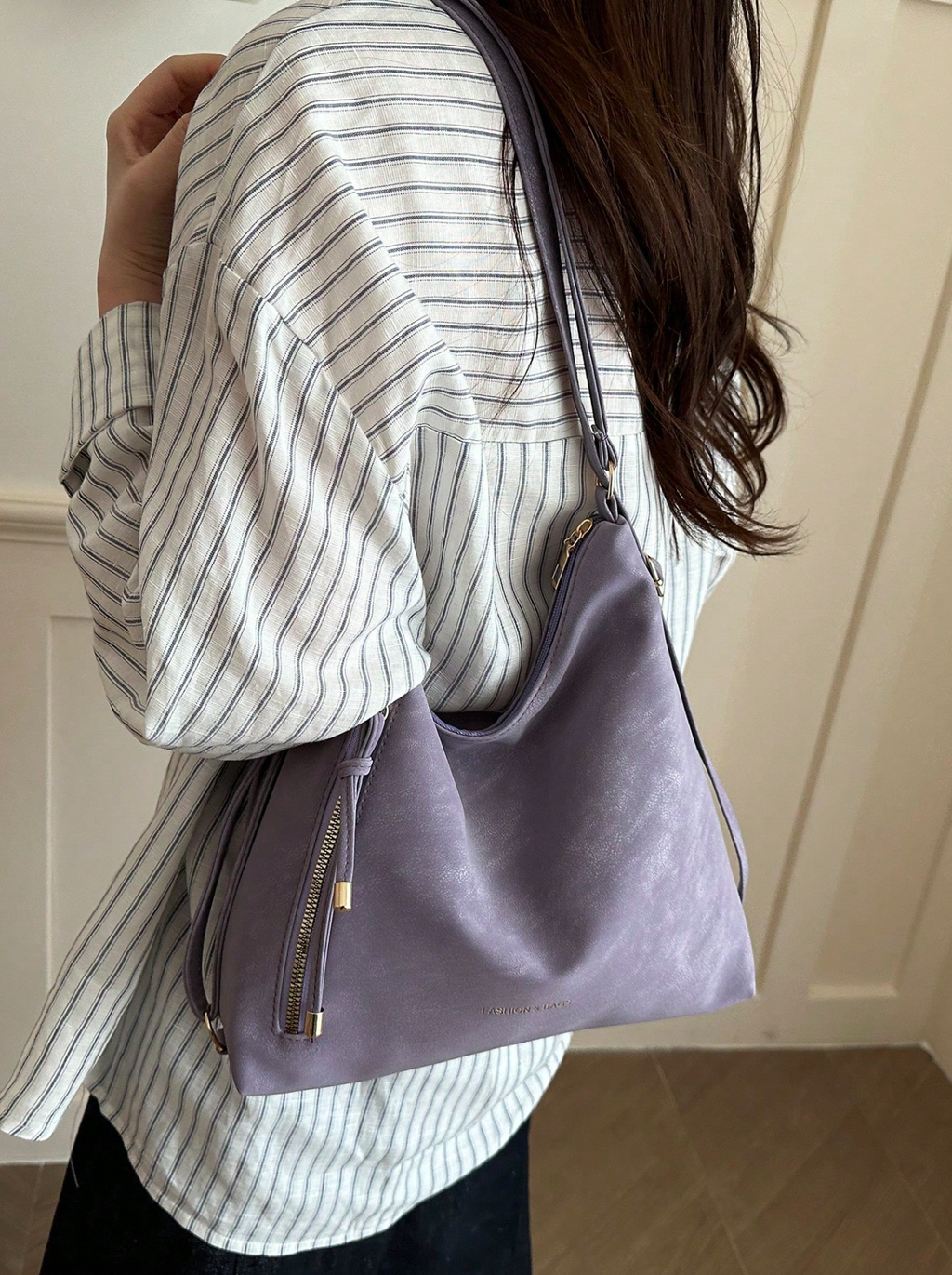 The Angled Zip Convertible Tote Elitaire