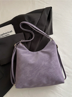 The Angled Zip Convertible Tote Elitaire