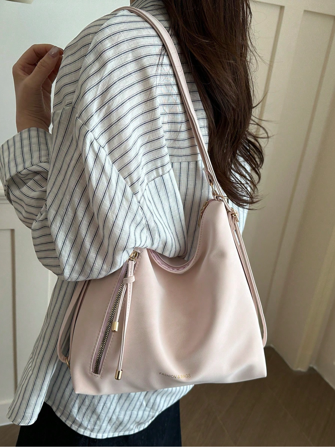 The Angled Zip Convertible Tote Elitaire