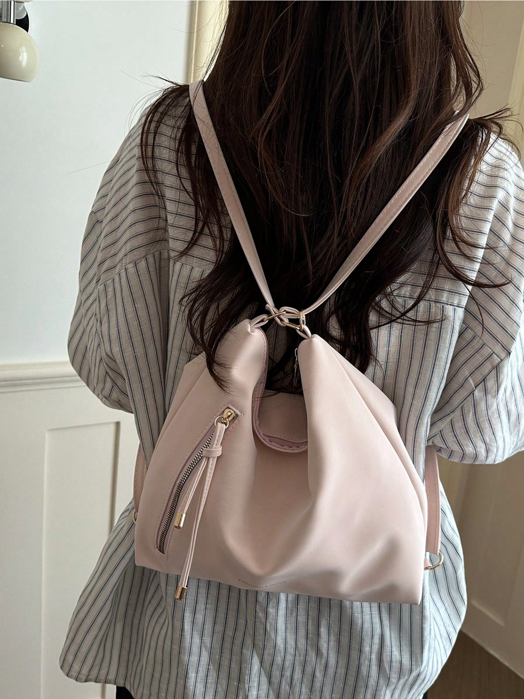 The Angled Zip Convertible Tote Elitaire