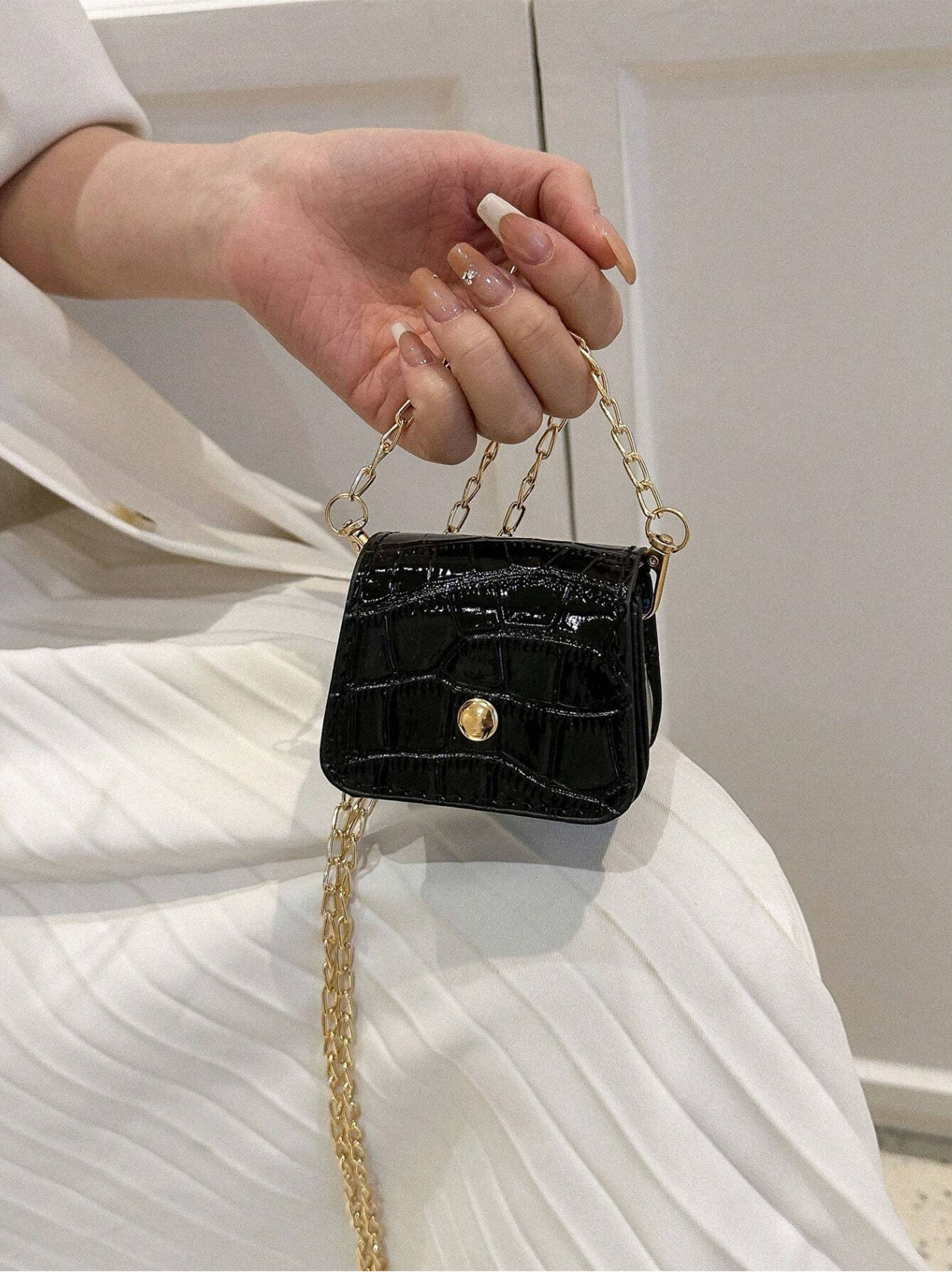 Embossed Nano Bag Elitaire