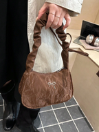 The Petite Ribbon Baguette Elitaire