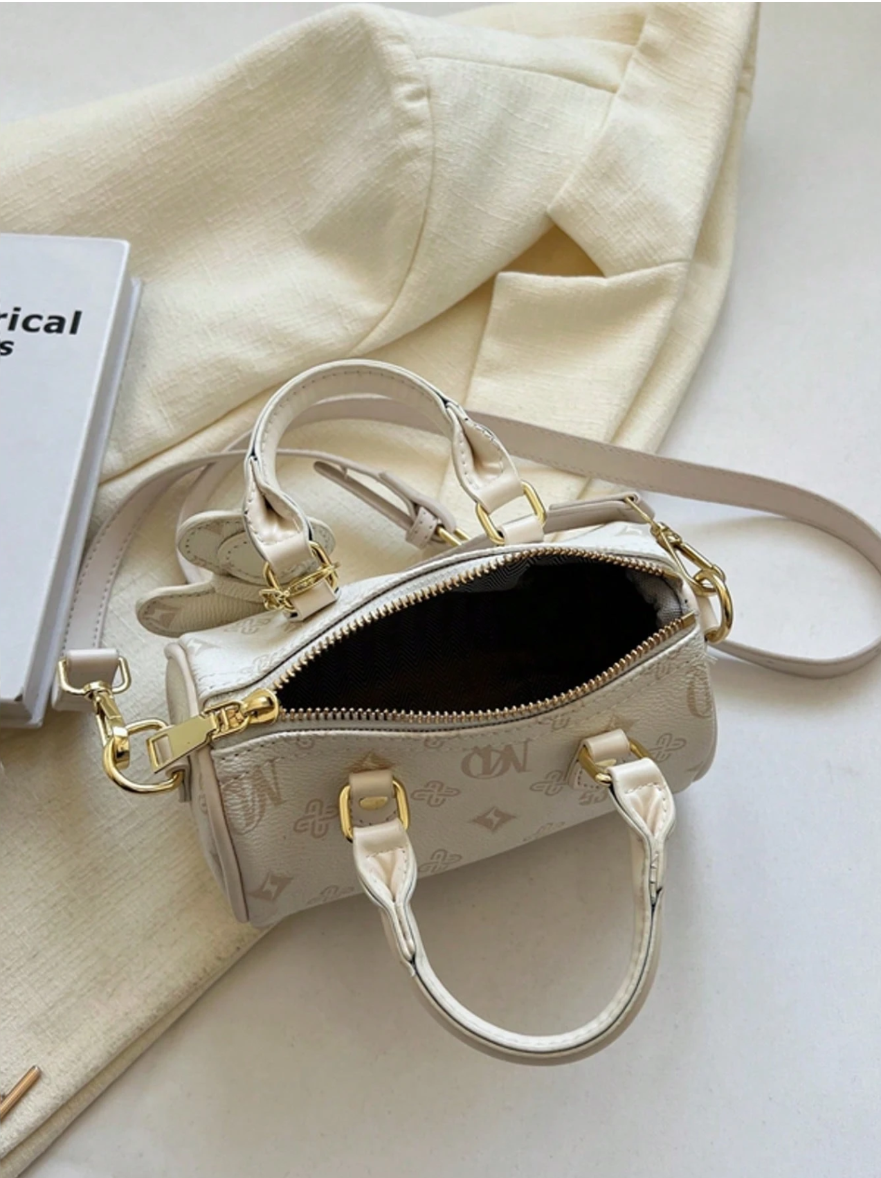 Quartz Monogram Barrel Bag Elitaire